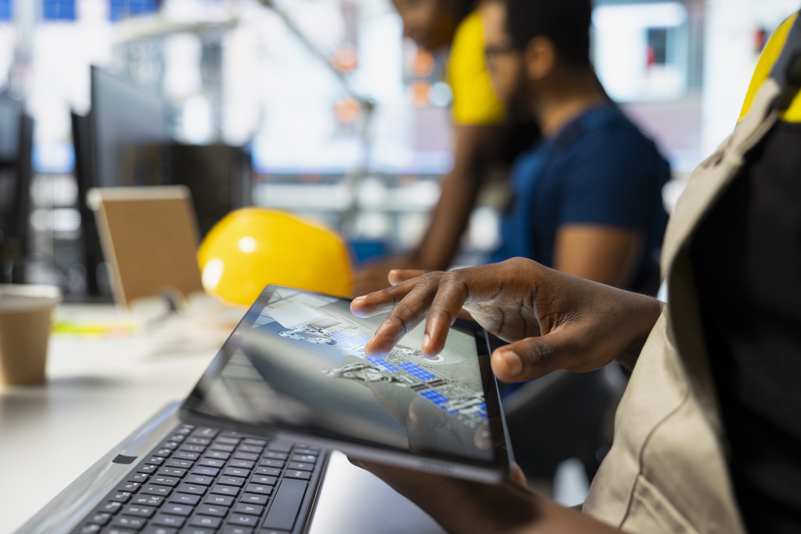 Industrial technical professional at work — illustrative company imagery, not a photograph of the CEO
